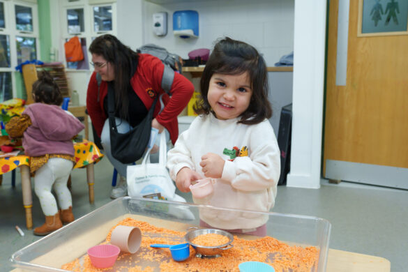 A young girl playing at one of the Children & Family Hubs